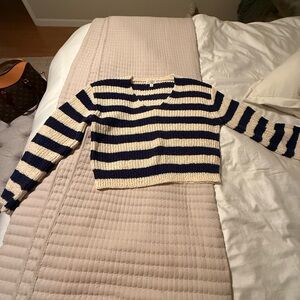 J. Crew navy blue and Cream V-Neck Sweater. Wore once. Great condition.